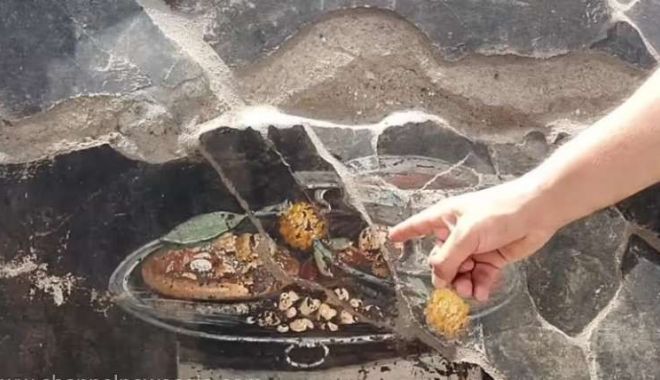 Frescă reprezentând o ”pizza”, descoperită la Pompei - pizza-1687884294.jpg