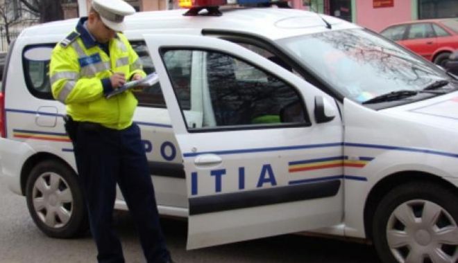 Scandal în parcarea unui mall din Constanța. Polițiștii, solicitați la locul incidentului - politia-1545577731.jpg