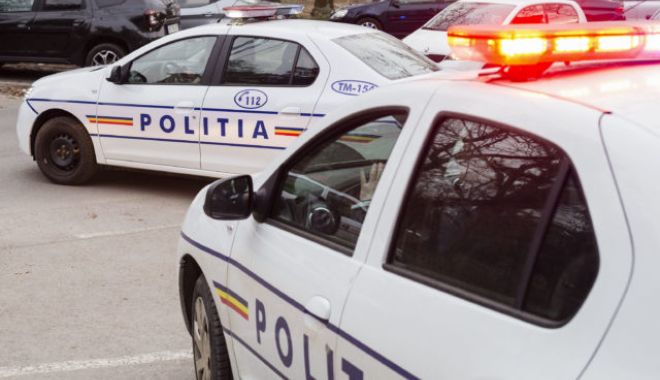 Bărbat încătușat în timpul paradei de Ziua Națională - politia-1575199820.jpg