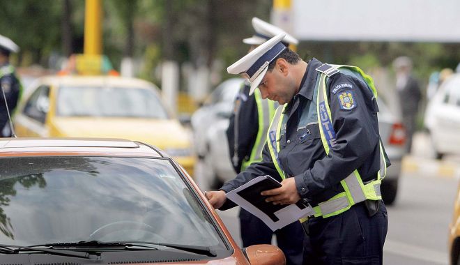 Șoferi, atenție! Poliția se modernizează: amenzile, plătite pe loc, cu cardul!