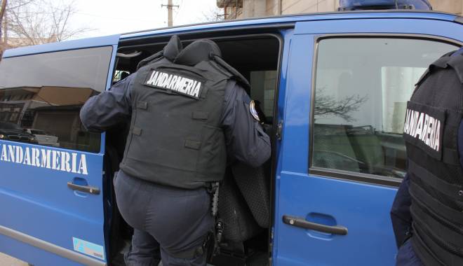 Percheziții în Constanța la suspecți de evaziune fiscală și spălare de bani - politiemascatijandarmipercheziti-1418023875.jpg