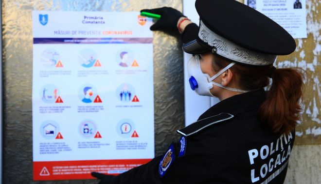 Polițiștii locali continuă lipirea afișelor de informare în scările de bloc din oraș - politistiilocalisursaprimariacon-1584368577.jpg