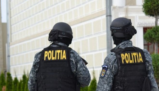Polițiștii fac percheziții la companii din subordinea Ministerului Transporturilor - politistiiperchezitii-1528961512.jpg