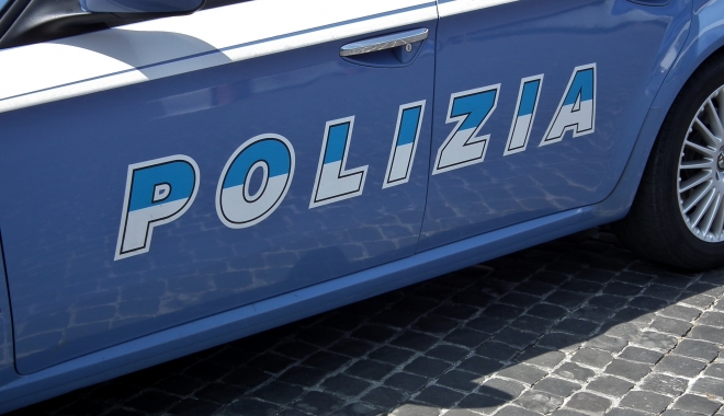Român împușcat mortal în timp ce jefuia un bar - polizia-1489306571.jpg