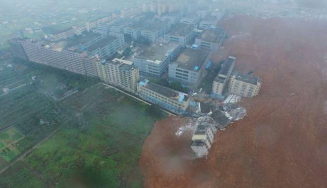 Alunecare masivă de teren. Cel puțin 91 de dispăruți - potdlandslide3531472k71518500-1450704727.jpg