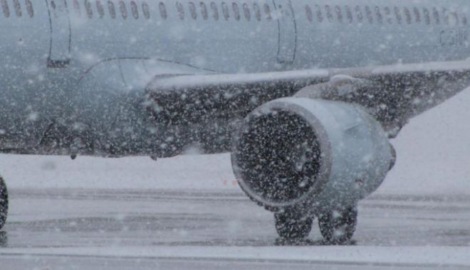 Probleme pe aeroporturi din cauza ninsorii! - ptgwmczoyxnoptlmyziwnmvmztnin2zm-1543389940.jpg