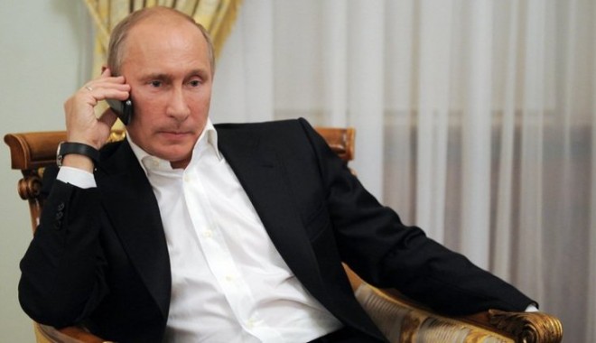 Putin a vorbit cu președintele Iranului  despre situația din Siria - putin-1377838491.jpg