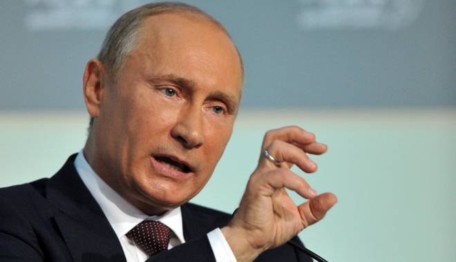 Vladimir Putin cere încetarea luptelor din Ucraina - putinclaw-1422913249.jpg