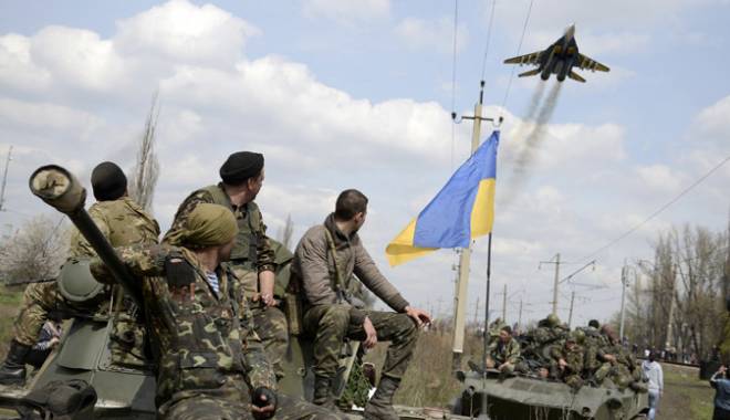 Ucraina / Armata și rebelii din Lugansk au convenit să înceteze luptele începând de vineri - razboi-1417506087.jpg