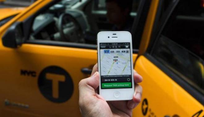 Românii, dezinteresați de aplicația de transport Uber - romaniidezinteresati-1425812088.jpg