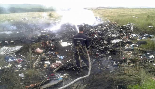 Descoperire uluitoare despre avionul Malaysia Airlines, prăbușit în Ucraina - rtr3z2aw-1430118513.jpg