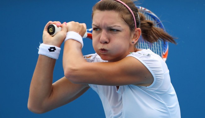 Simona Halep și Victor Hănescu merg mai departe - simona-1389711473.jpg