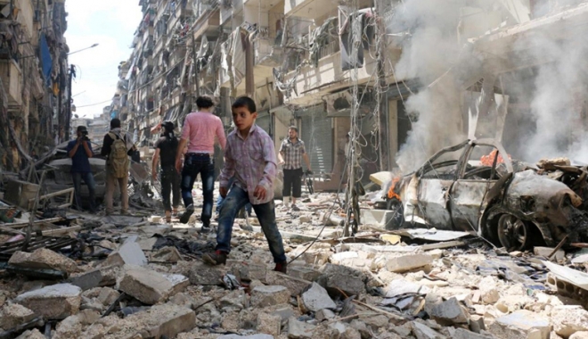 Siria: 21 de civili, dintre care opt copii, uciși în raiduri aeriene - siria-1515411785.jpg