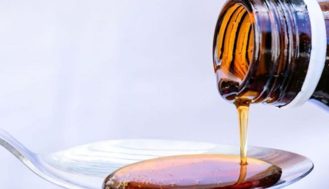Sute de copii morți după ce au primit sirop de tuse contaminat cu substanțe toxice și soluții antigel - sirop-1674575606.jpg