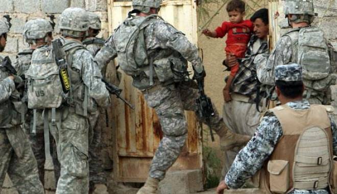 Sute de militari americani, expuși unor agenți chimici în Irak - soldatiusa-1415361950.jpg
