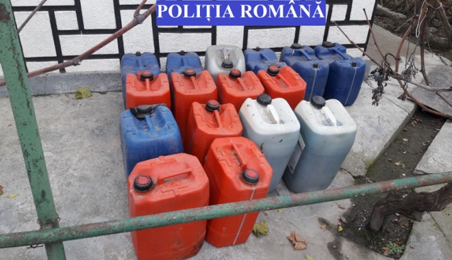 Sute de litri  de motorină  și trofee de cerb, confiscate  de polițiști - sute1-1511802032.jpg