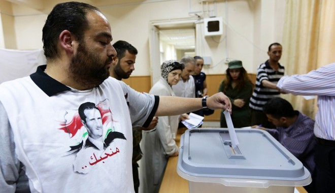 Sirienii prelungesc scrutinul prezidențial, în contextul unei prezențe masive la vot - syria-1401814159.jpg