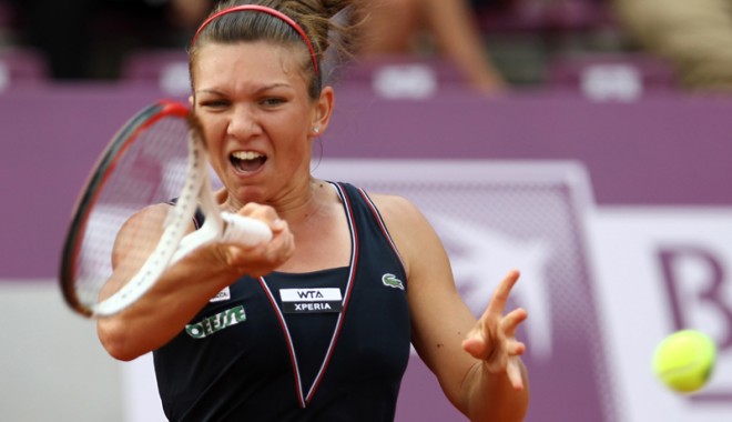 În primul tur la Beijing, Simona Halep a fost învinsă de Radwanska - tenishalep-1380464512.jpg