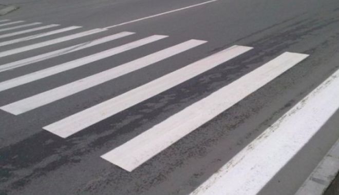 ACCIDENT TERIBIL! Un copil, SPULBERAT de un echipaj de poliție chiar pe trecerea de pietoni - trecere-1566918695.jpg