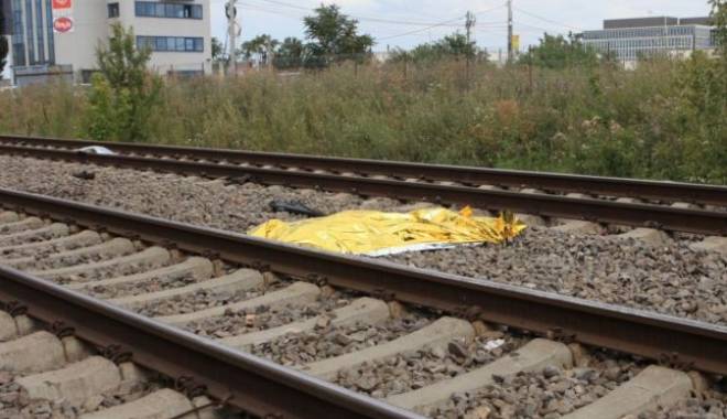 TRAGEDIE LA CONSTANȚA. O FEMEIE A FOST SPULBERATĂ DE TREN! - tren-1449331262.jpg