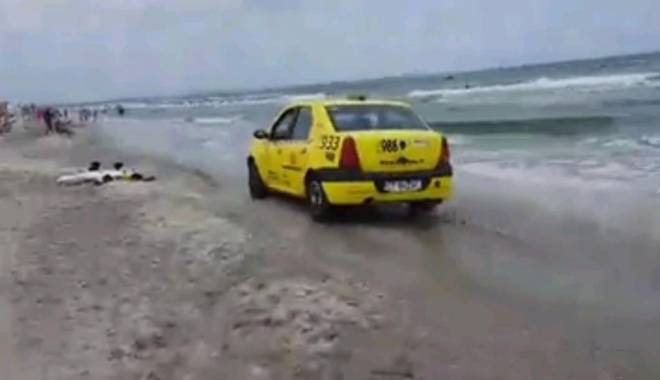 Ce a pățit șoferul care a intrat cu TAXIUL pe plajă - tupeu10iulie1436546760-1436775035.jpg