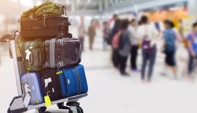 O femeie oprită pe aeroport avea oasele soțului în bagaje - valiza-1596702559.jpg