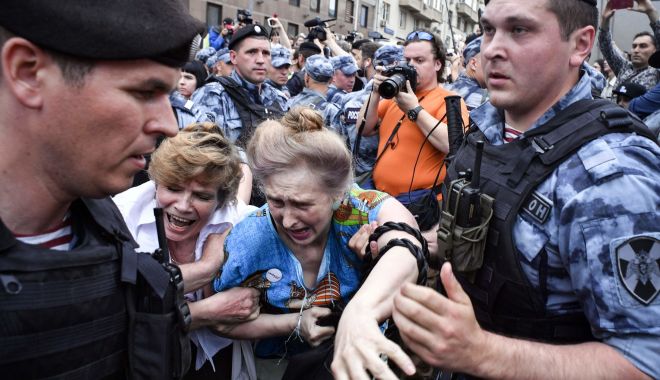 Zeci de percheziții în Rusia, împotriva susținătorilor lui Aleksei Navalnîi - zeci-1568316652.jpg