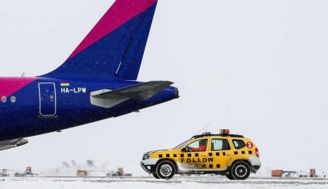 Condițiile meteo cauzează întârzieri aeronavelor de pe Otopeni - zmqxzdg0zji2ngjmyjrkzwmyowjlnty1-1547202947.jpg