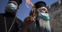 Câțiva credincioși ortodocși au asistat la aprinderea Luminii Sfinte din Ierusalim