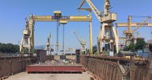 Stire din Economie : Bate vântul a pagubă prin Şantierul Naval Damen Mangalia. Muncitorii, sătui de promisiuni!