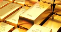 Stire din Economie : Preţul aurului a atins un nou maxim istoric, de 415,3204 lei/gram