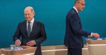 Stire din Actualitate : Schimb dur de replici între Scholz şi Merz, în ultima dezbatere parlamentară înaintea alegerilor