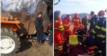 Stire din Eveniment : Două persoane rănite, după ce remorca unui tractor s-a răsturnat peste ele