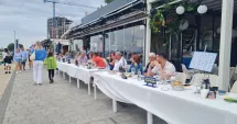 Stire din Social : Record culinar în Portul Tomis! Borș pescăresc de o tonă, servit gratuit la cea mai lungă masă din Constanța