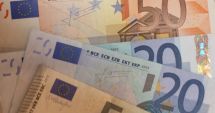 Stire din Economie : Euro ar putea depăși pragul de 5 lei în vara lui 2025. Ce spun reprezentanții BNR