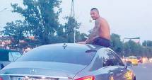 Stire din Eveniment : Amendat după ce s-a plimbat  pe capota mașinii prin Mamaia