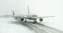 Stire din Eveniment : Curse aeriene anulate pe aeroportul din Otopeni
