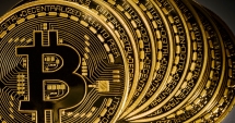 Stire din Tehnologie : Moneda virtuală Bitcoin a depășit un nou prag istoric: 5.000 de dolari
