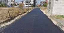 Carosabil asfaltat pe strada Ion Voicu din cartierul Compozitorilor