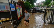 Stire din Actualitate : Cel puţin cinci morţi din cauza ploilor torenţiale în China