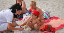 Stire din Social : De ce au nevoie de "Brățara de vacanță" copiii turiștilor  care ajung pe litoral