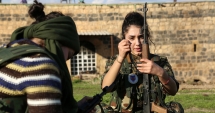 Stire din Actualitate : "Fălci de crocodil", una dintre luptătoarele  de temut ale ISIS,  a rămas fără arma ei feroce: dinții