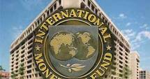 Stire din Economie : FMI își reduce previziunile de crește a economiei mondiale