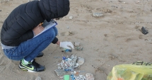 Stire din Social : Dezastru pe litoral. Cum au ajuns plajele  din Constanța, Eforie și Mamaia să aibă  mai multe mucuri de țigară decât nisip