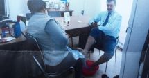 Stire din Eveniment : Răsturnare de situație. Directorul care și-a pus subordonata să-i facă pedichiura a depus plângere pentru șantaj