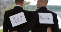 Stire din Actualitate : Parlamentul Australiei a adoptat legea privind căsătoriile între persoane de același sex