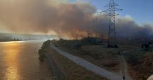 Stire din Eveniment : Trenuri oprite temporar din cauza incendiului de vegetație, pe calea ferată București-Constanța