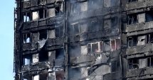 Stire din Actualitate : Incendiu devastator într-un bloc-turn  din Londra.  "În turn se mai află  un număr necunoscut de cadavre"