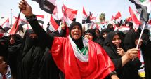 Stire din Actualitate : Irak: Proteste și drapele americane arse după lovitura din Siria