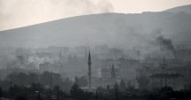 Stire din Actualitate : Kobane: arme lansate de americani au căzut în mâinile SI